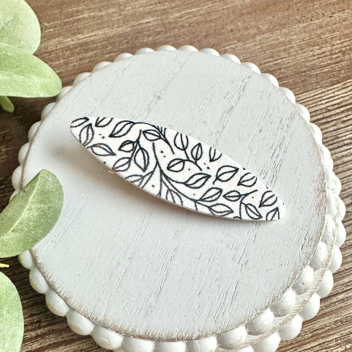 Barrette - Oval Black and White Leaf